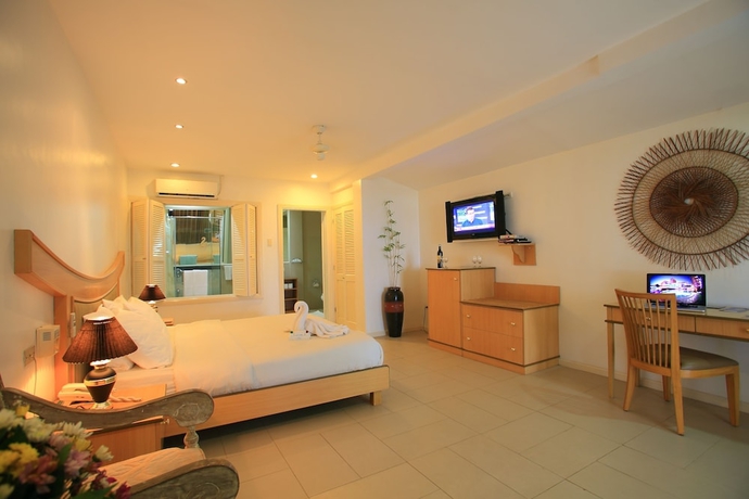 Imagen de la habitación del Hotel Wild Orchid Beach Resort. Foto 4