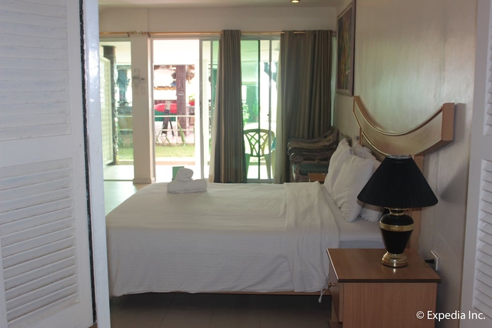 Imagen de la habitación del Hotel Wild Orchid Beach Resort. Foto 5