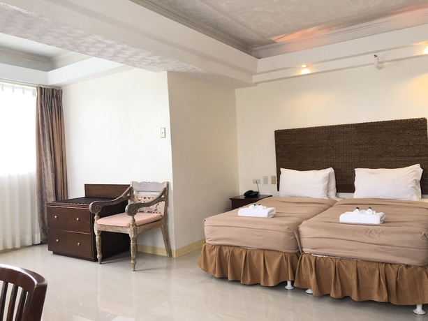 Imagen de la habitación del Hotel Wild Orchid Beach Resort. Foto 6