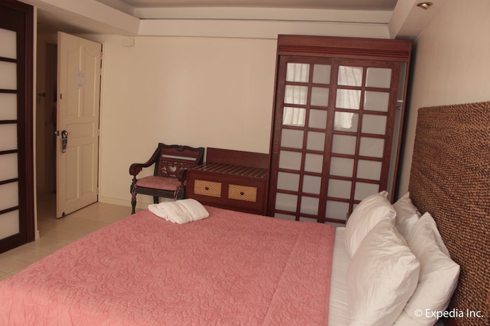 Imagen de la habitación del Hotel Wild Orchid Beach Resort. Foto 9