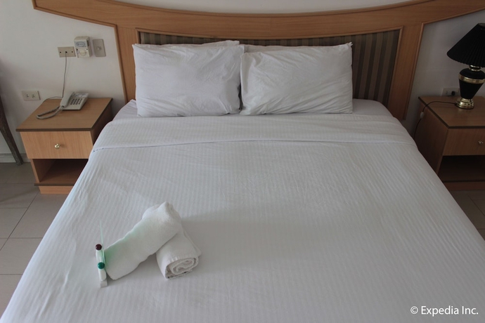 Imagen de la habitación del Hotel Wild Orchid Beach Resort. Foto 11