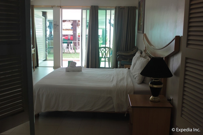 Imagen de la habitación del Hotel Wild Orchid Beach Resort. Foto 12