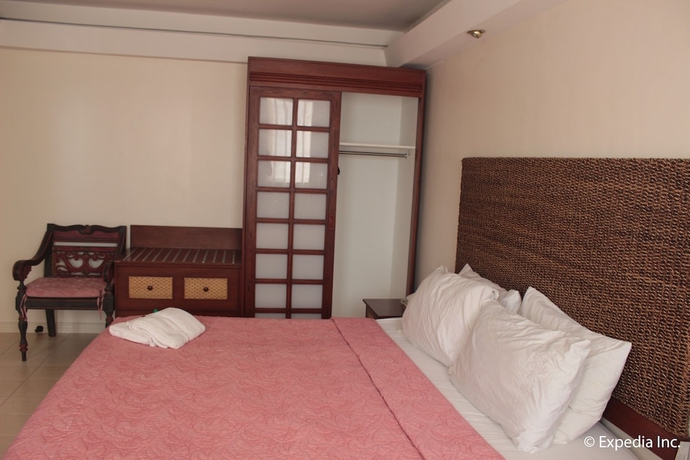 Imagen de la habitación del Hotel Wild Orchid Beach Resort. Foto 14