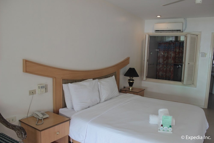 Imagen de la habitación del Hotel Wild Orchid Beach Resort. Foto 16