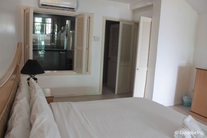 Imagen de la habitación del Hotel Wild Orchid Beach Resort. Foto 17