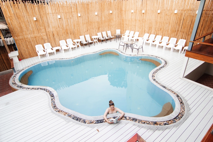 Imagen de la piscina del Hotel Wild Orchid Villa. Foto 6