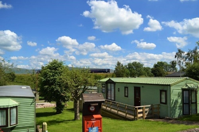 Imagen de los exteriores del Hotel Wild Rose Caravan Park. Foto 9