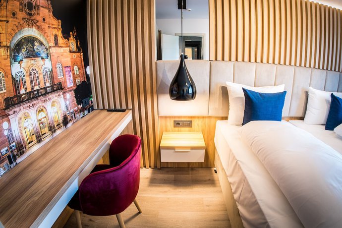 Imagen de la habitación del Hotel Wilder Mann. Foto 13