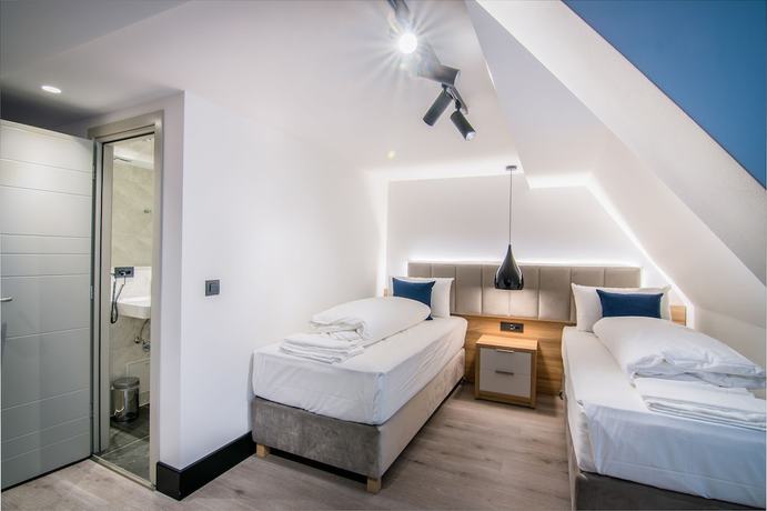 Imagen de la habitación del Hotel Wilder Mann, R&uuml;ckersdorf. Foto 5