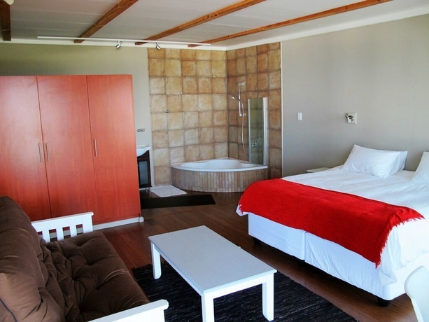 Imagen de la habitación del Hotel Wilderness Beach Resort. Foto 8