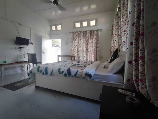 Imagen de la habitación del Hotel Wildernest, Golaghat. Foto 3
