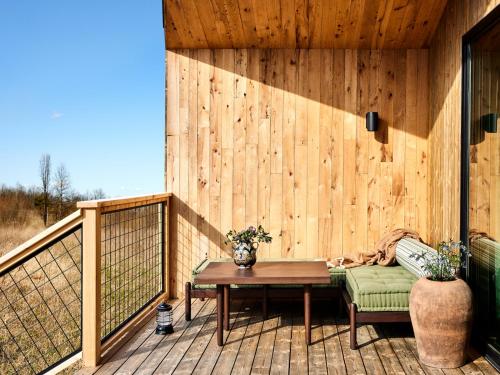 Imagen de la habitación del Hotel Wildflower Farms. Foto 16