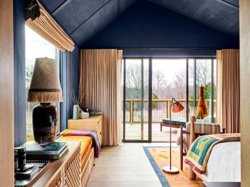 Imagen de la habitación del Hotel Wildflower Farms. Foto 17