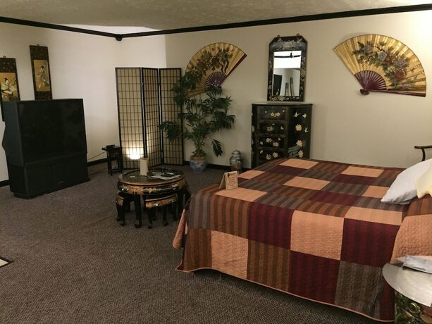 Imagen de la habitación del Hotel Wildwood Inn Tropical Dome And Theme Suites. Foto 12