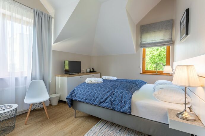 Imagen de la habitación del Hotel Willa 4 Pory Roku Uznam. Foto 17