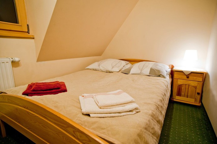 Imagen de la habitación del Hotel Willa Aniołówka. Foto 14