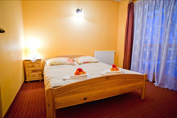 Imagen de la habitación del Hotel Willa Aniołówka. Foto 15