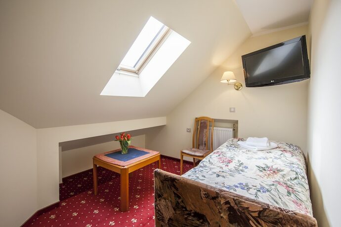 Imagen de la habitación del Hotel Willa Carlton. Foto 12