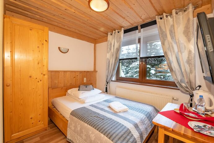 Imagen de la habitación del Hotel Willa Cztery Pory Roku. Foto 14