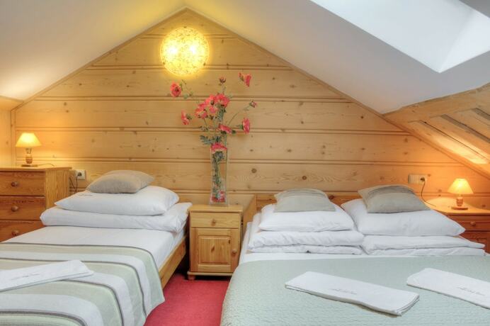 Imagen de la habitación del Hotel Willa Cztery Pory Roku. Foto 16