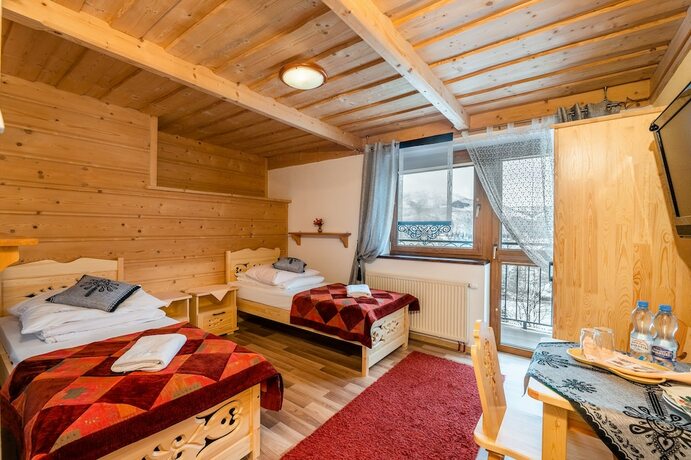 Imagen de la habitación del Hotel Willa Cztery Pory Roku. Foto 17