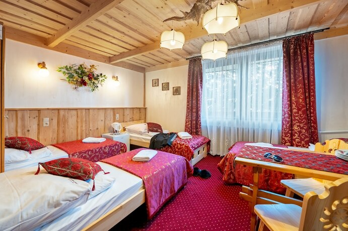 Imagen de la habitación del Hotel Willa Cztery Pory Roku. Foto 18