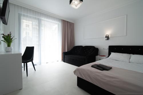 Imagen de la habitación del Hotel Willa Piryt Apartamenty i Pokoje Krynica Morska. Foto 3
