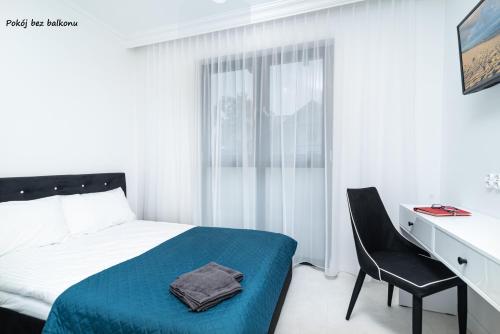 Imagen de la habitación del Hotel Willa Piryt Apartamenty i Pokoje Krynica Morska. Foto 5