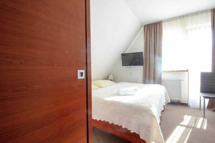 Imagen de la habitación del Hotel Willa Stożek. Foto 13