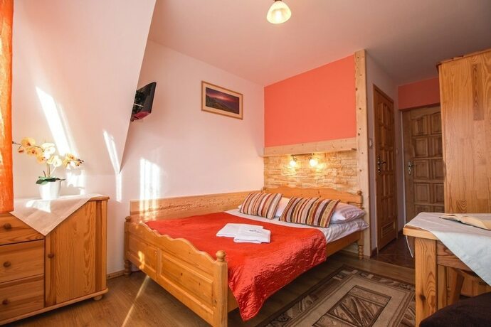Imagen de la habitación del Hotel Willa Trebunia. Foto 17