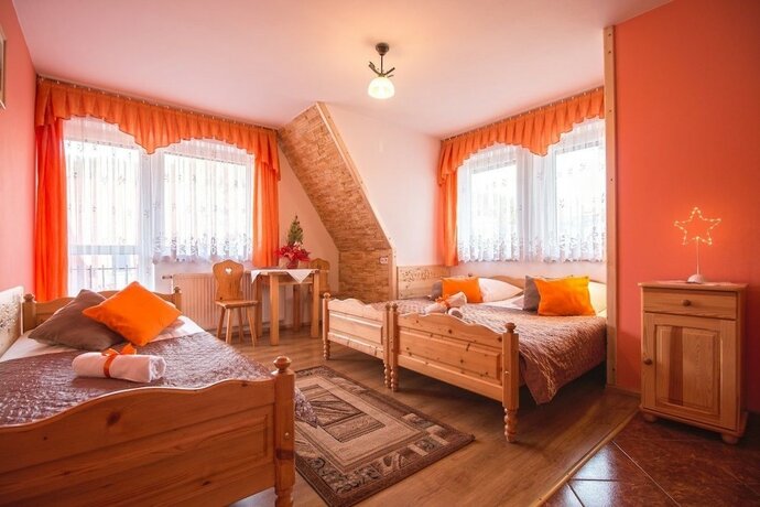 Imagen de la habitación del Hotel Willa Trebunia. Foto 18