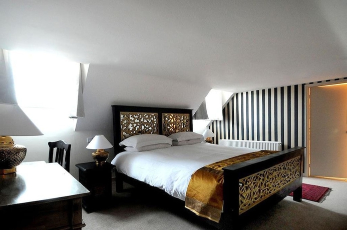 Imagen de la habitación del Hotel William Cecil. Foto 12