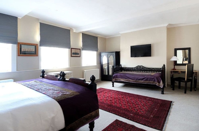 Imagen de la habitación del Hotel William Cecil. Foto 15