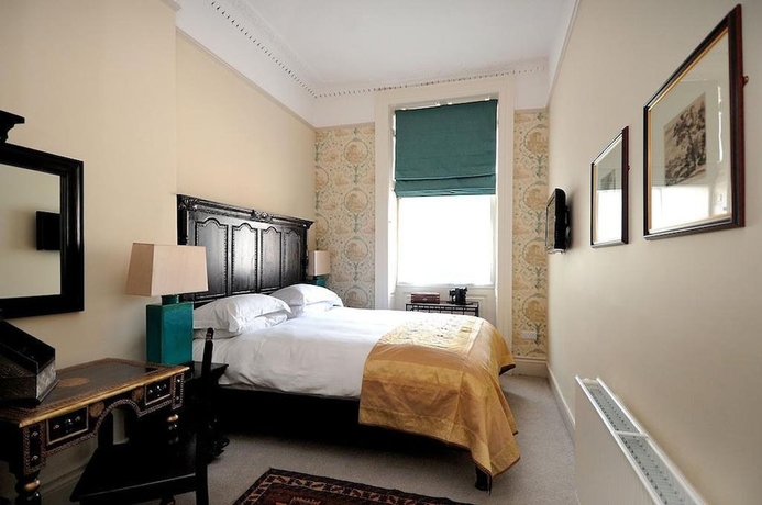 Imagen de la habitación del Hotel William Cecil. Foto 17