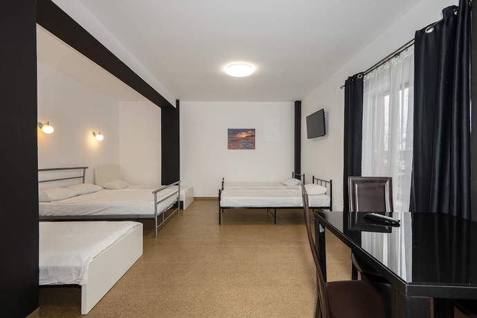 Imagen de la habitación del Hotel William. Foto 8