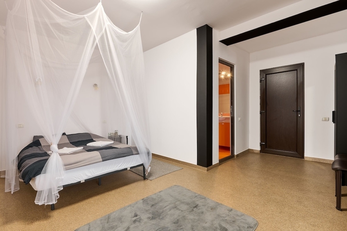Imagen de la habitación del Hotel William. Foto 10