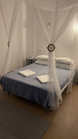 Imagen de la habitación del Hotel William. Foto 11