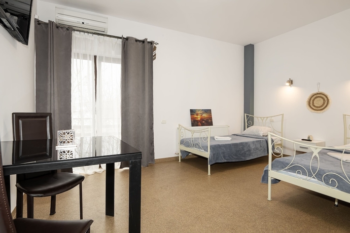 Imagen de la habitación del Hotel William. Foto 12