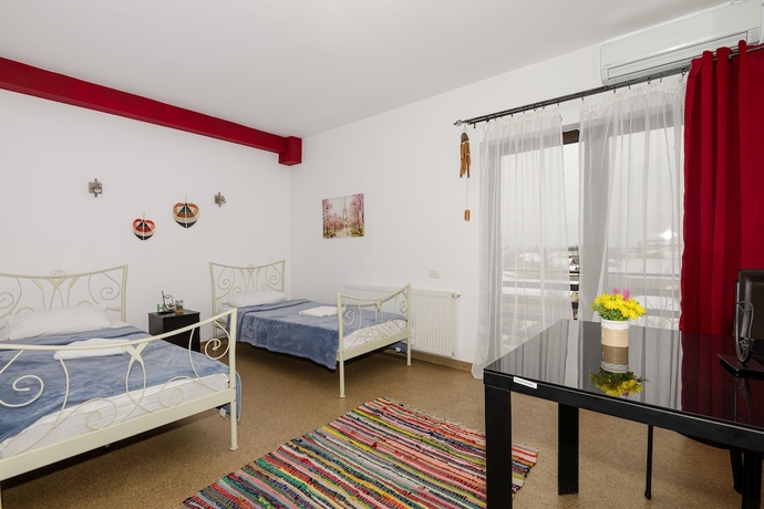 Imagen de la habitación del Hotel William. Foto 13