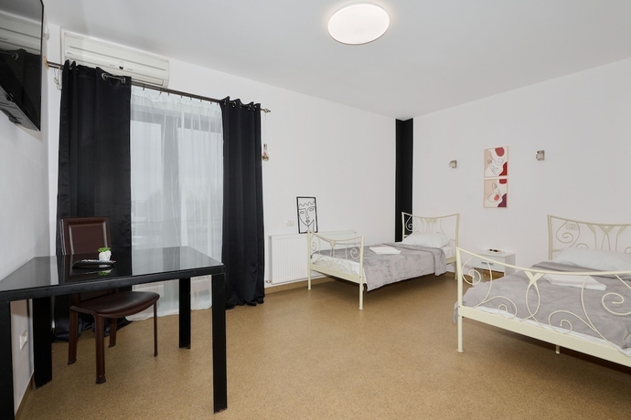 Imagen de la habitación del Hotel William. Foto 14