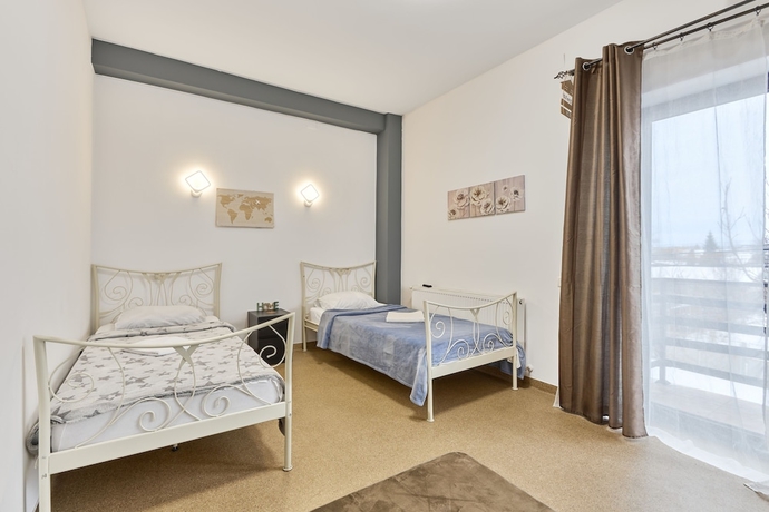 Imagen de la habitación del Hotel William. Foto 15