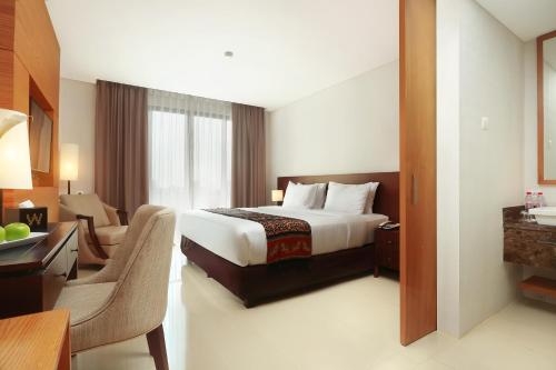 Imagen de la habitación del Hotel Wimarion Semarang. Foto 7