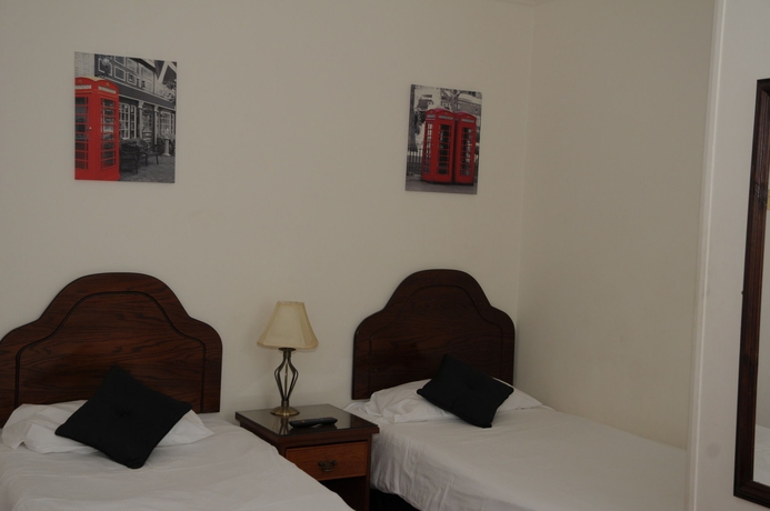 Imagen de la habitación del Hotel Wimblehurst. Foto 2