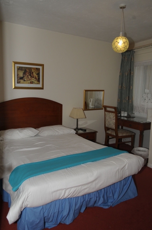 Imagen de la habitación del Hotel Wimblehurst. Foto 7