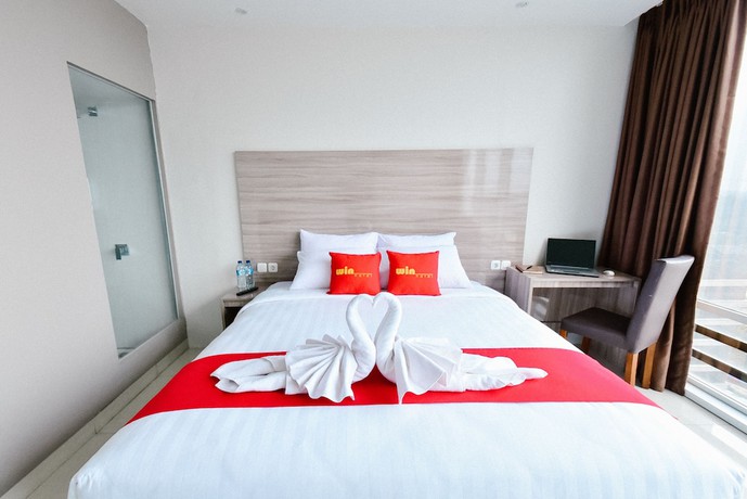 Imagen de la habitación del Hotel Win Grand. Foto 6