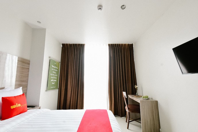 Imagen de la habitación del Hotel Win Grand. Foto 10