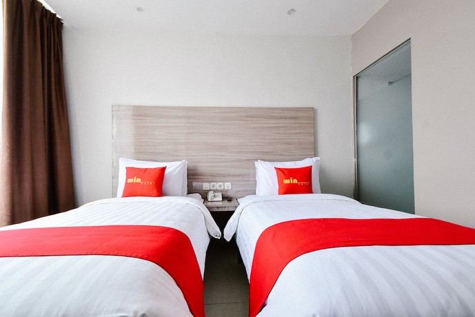 Imagen de la habitación del Hotel Win Grand. Foto 14