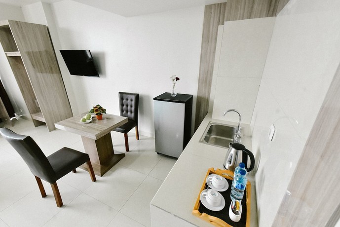 Imagen de la habitación del Hotel Win Grand. Foto 15