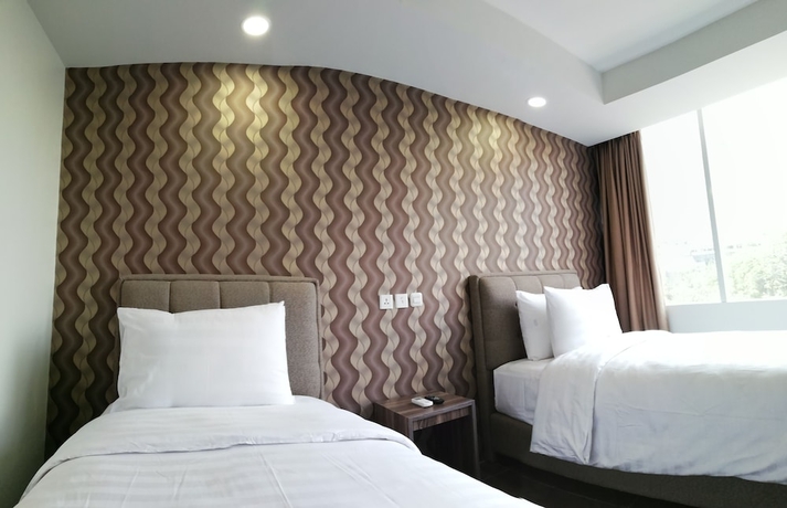 Imagen de la habitación del Hotel Win Premier Mangga Besar. Foto 6