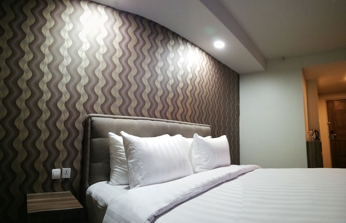 Imagen de la habitación del Hotel Win Premier Mangga Besar. Foto 8